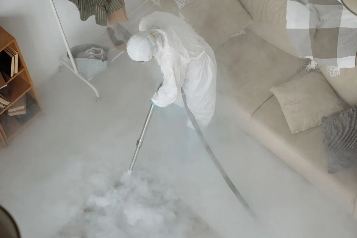 Biohazard cleanup technician in protective equipment, Gladeview, FL